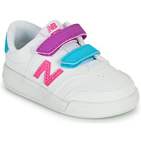 Cipők Lány Rövid szárú edzőcipők New Balance COURT Fehér / Rózsaszín